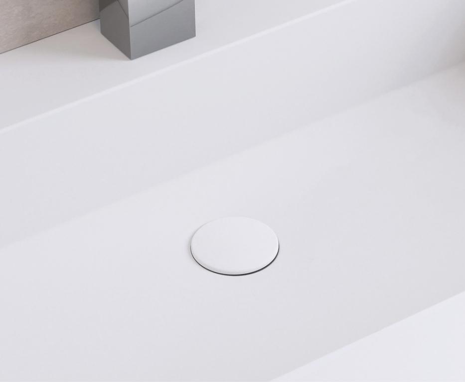 außergewöhnliches Waschbecken mit verdecktem Ablauf